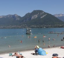 Relaxing and paddling on the beach at Saint-Jorioz, Lake Annecy