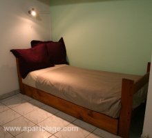 Conversion of bench seat into a single bed in hall way, apartplage